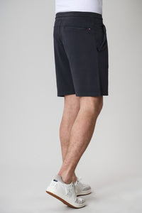 Pantaloni corti sportivi over dyed con logo