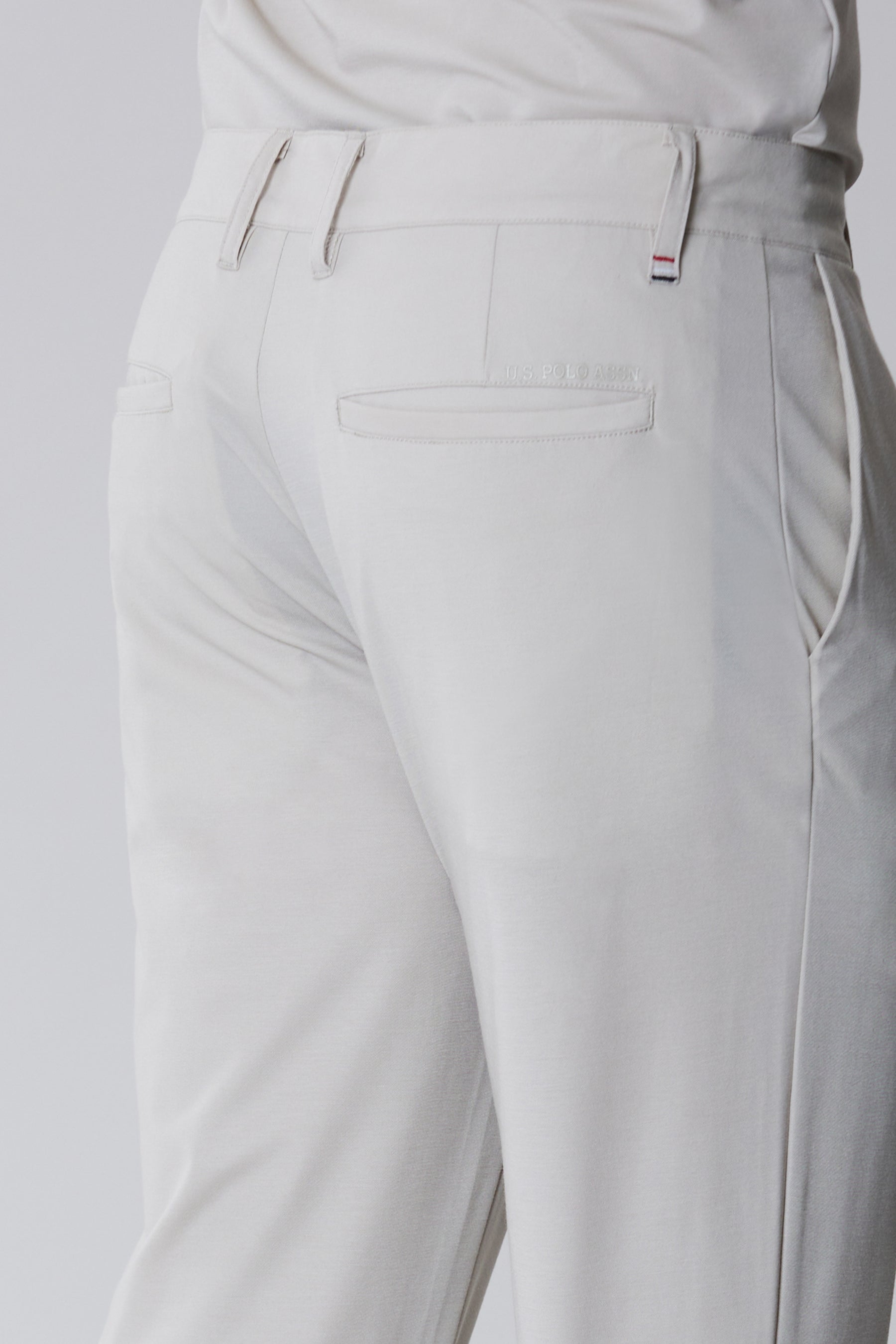 Pantalone chino in stretch jersey tecnico