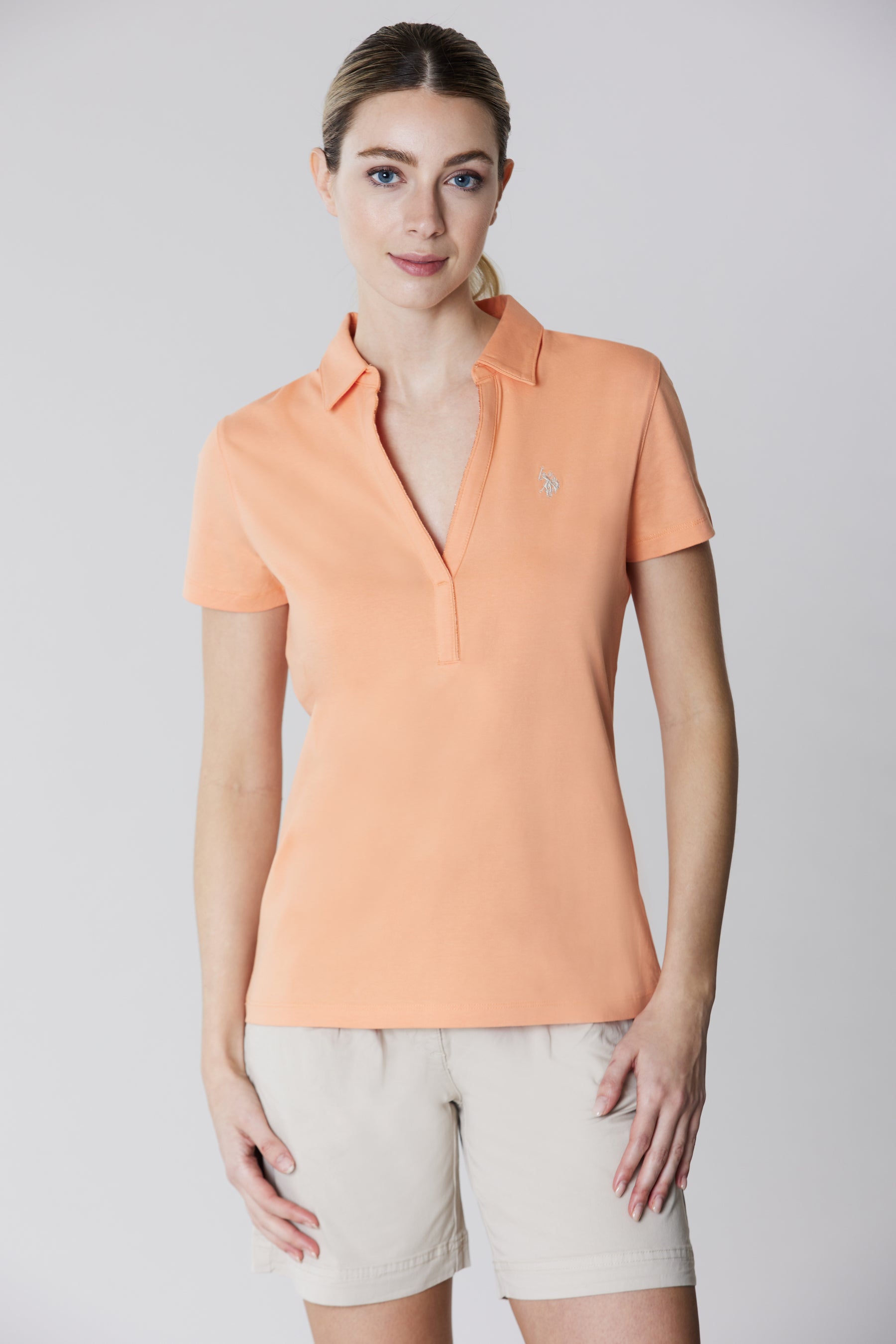 Polo a maniche corte stretch con scollo a V